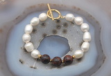 CFB957 Hand-knotted 9mm - 10mm rice white freshwater pearl & mahogany obsidian bracelet