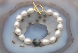 CFB960 Hand-knotted 9mm - 10mm rice white freshwater pearl & eagle eye jasper bracelet