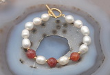 CFB961 Hand-knotted 9mm - 10mm rice white freshwater pearl & fire agate bracelet