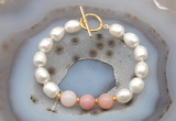 CFB965 Hand-knotted 9mm - 10mm rice white freshwater pearl & pink opal bracelet