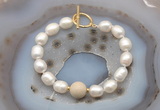 CFB968 Hand-knotted 9mm - 10mm rice white freshwater pearl & white fossil jasper bracelet