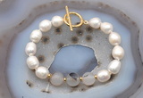 CFB972 Hand-knotted 9mm - 10mm rice white freshwater pearl & montana agate bracelet