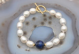 CFB980 Hand-knotted 9mm - 10mm rice white freshwater pearl & blue tiger eye bracelet