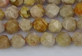 CFC236 15.5 inches 6mm faceted nuggets fossil coral beads