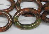 CFG271 15.5 inches 24*30mm carved oval unakite gemstone beads