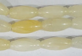 CFG552 15.5 inches 8*20mm carved rice yellow aventurine beads