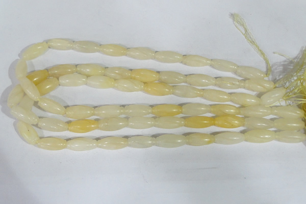 CFG552 15.5 inches 8*20mm carved rice yellow aventurine beads