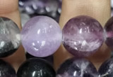 CFL914 15.5 inches 12mm round purple fluorite beads wholesale