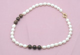 CFN346 9 - 10mm rice white freshwater pearl & bronzite necklace wholesale