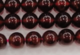 CGA605 15.5 inches 8mm A+ grade round natural orange garnet beads