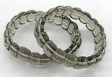 CGB3463 7.5 inches 10*14mm faceted oval smoky quartz bracelets