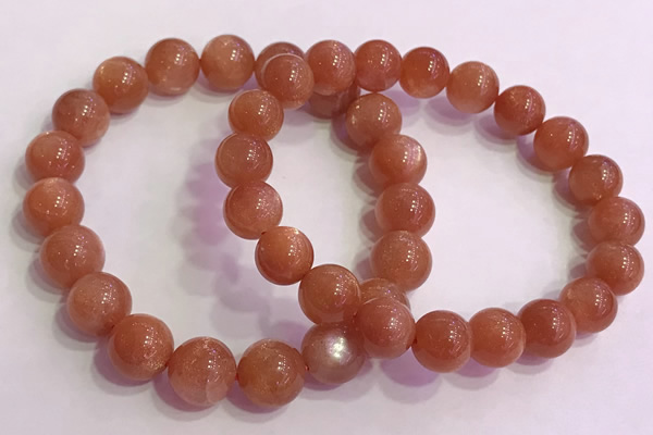 CGB4540 7.5 inches 10mm - 11mm round golden sunstone beaded bracelets