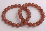 CGB4544 7.5 inches 10mm round golden sunstone beaded bracelets