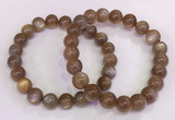 CGB4549 7.5 inches 9mm - 10mm round sunstone beaded bracelets