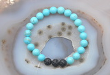 CGB6408 8mm round blue howlite & black lava beaded bracelets