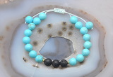 CGB6586 8mm round blue howlite & black lava adjustable bracelets