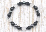 CGB8320 8mm matte white crystal, black onyx & hematite energy bracelet