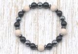 CGB8370 8mm white fossil jasper, black onyx & hematite energy bracelet