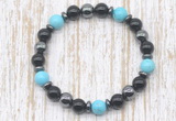 CGB8379 8mm blue howlite, black onyx & hematite energy bracelet