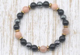 CGB8394 8mm sunstone, black onyx & hematite energy bracelet