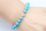 CGB9352 8mm, 10mm blue howlite & cross hematite power beads bracelets