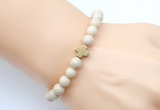 CGB9360 8mm, 10mm white fossil jasper & cross hematite power beads bracelets