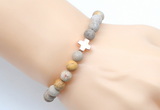 CGB9434 8mm, 10mm matte fossil coral & cross hematite power beads bracelets