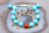 CGB9612 12mm round blue howlite & red jasper adjustable bracelets