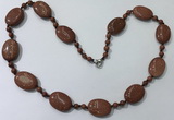 CGN201 22 inches 6mm round & 18*25mm oval goldstone necklaces