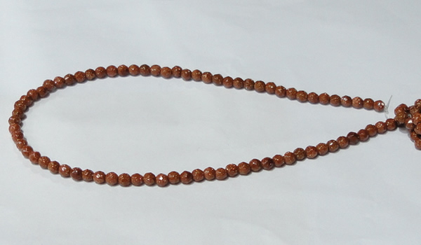 CGS57 15.5 inches 6mm faceted round goldstone beads wholesale