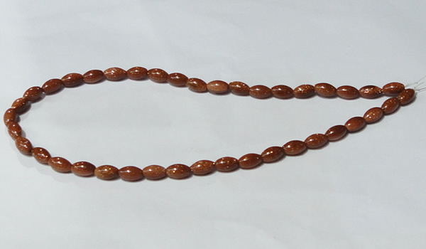 CGS69 15.5 inches 6*10mm rice goldstone beads wholesale