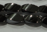 CHE161 15.5 inches 6*12mm twisted rice hematite beads