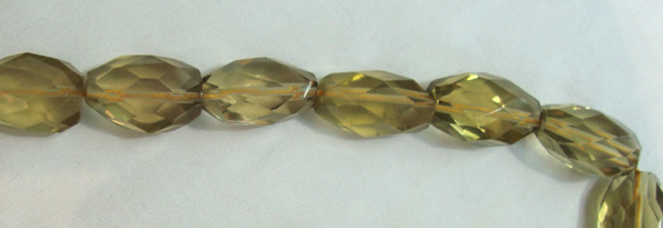 CLQ06 15.5 inches faceted rice natural lemon quartz beads