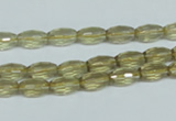 CLQ10 15.5 inches 6*10mm faceted rice natural lemon quartz beads