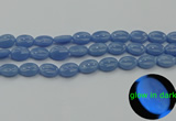 CLU141 15.5 inches 10*14mm oval blue luminous stone beads