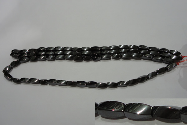 CMH152 15.5 inches 5*11mm twisted rice magnetic hematite beads