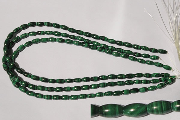 CMN210 15.5 inches 5*9mm rice natural malachite beads wholesale