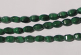 CMN222 15.5 inches 4*6mm faceted rice natural malachite beads