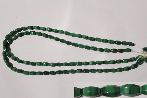 CMN223 15.5 inches 5*9mm faceted rice natural malachite beads