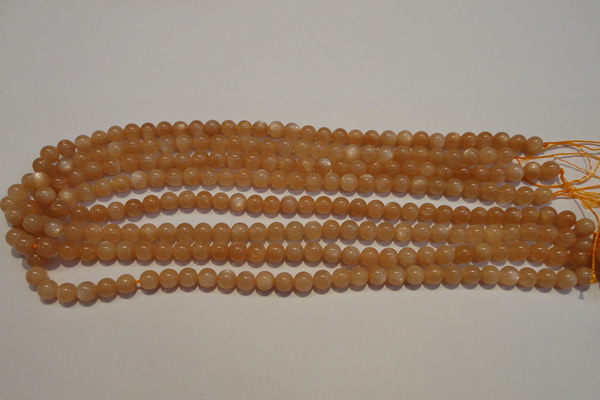 CMS701 15.5 inches 6mm round peach moonstone beads wholesale