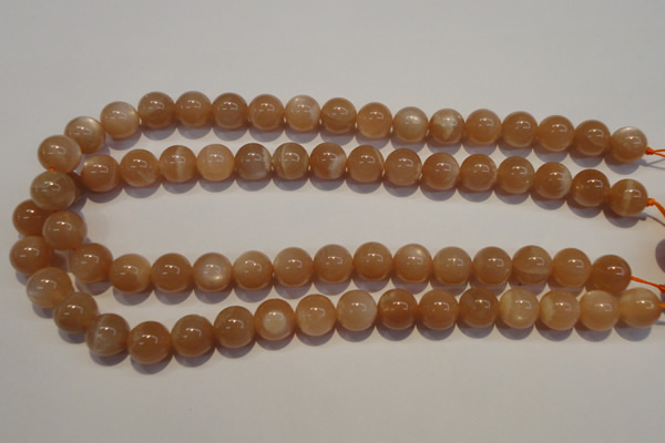 CMS704 15.5 inches 12mm round peach moonstone beads wholesale