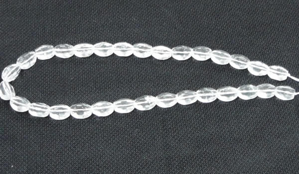 CNC62 15.5 inches 10*14mm faceted rice grade A natural white crystal beads