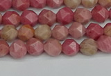 CNG7420 15.5 inches 6mm faceted nuggets rhodochrosite beads