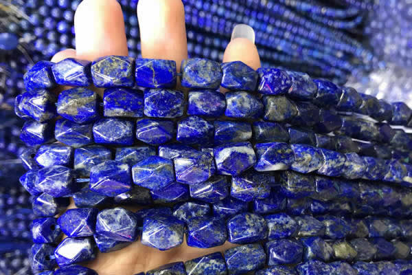 CNG7846 15.5 inches 8*12mm faceted nuggets lapis lazuli beads