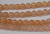 CPE02 15.5 inches 6mm round peach stone beads wholesale