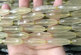 CRI132 15.5 inches 10*30mm faceted rice lemon quartz beads