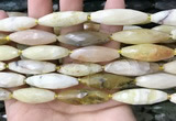 CRI143 15.5 inches 10*30mm faceted rice yellow opal gemstone beads