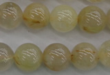 CRU583 15.5 inches 10mm round golden rutilated quartz beads