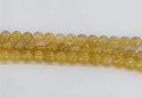 CRU661 15.5 inches 10mm round golden rutilated quartz beads