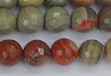 CSL233 15.5 inches 10mm faceted round silver leaf jasper beads